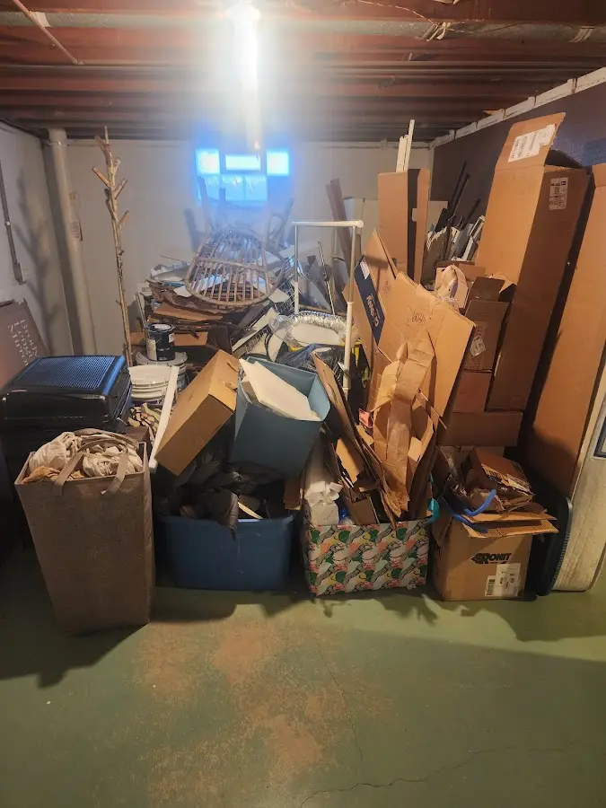 Roll-off dumpster container at job site for 2 Yard Dumpster Rental in Crowley